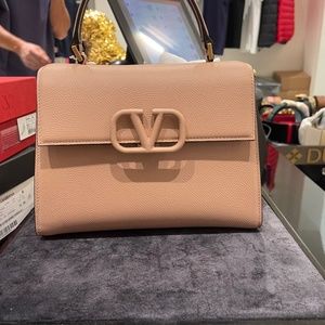 SMALL VSLING GRAINY CALFSKIN HANDBAG